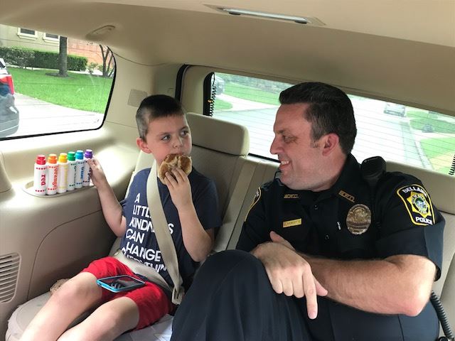 Officer and child talking 